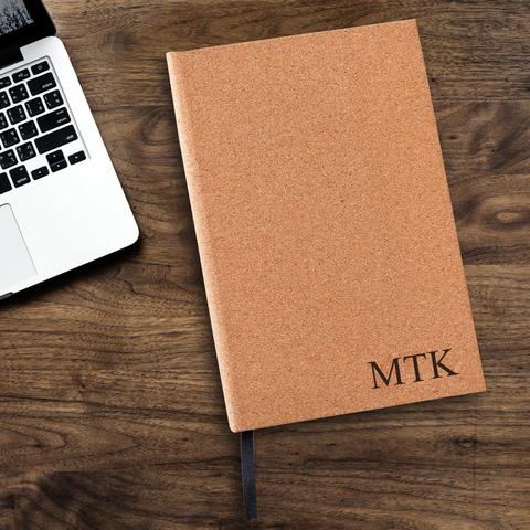 Journal with “MTK” initials on it